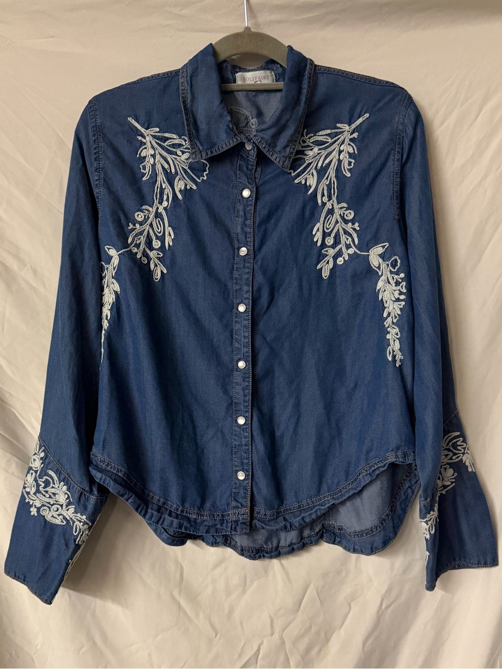 Solitaire Denim Garment with Red Logo Stitching